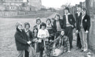 Pupils of class 1A at Powis Academy with science teacher Mr Alan Bainbridge planting trees around the school playing field as part of the Keep Grampian Beautiful campaign