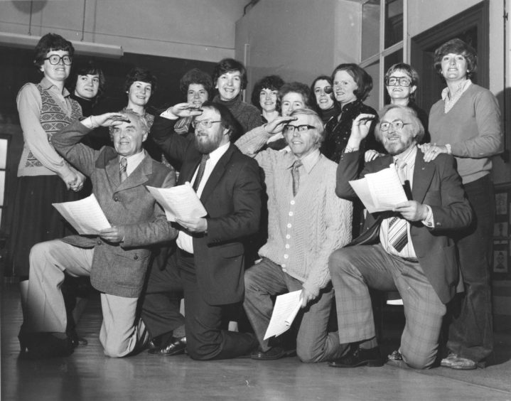1980: Man - this could be your big chance to be a singing or dancing star.
The Aberdeen company Pro Arte are staging the musical Cabaret in the Beach Ballroom in November, but they have a problem - their membership has dropped to 30, including nine men.
They hope to get back up to 50 shortly, but they are especially looking for more male singers and dancers.
So, come on chaps, if you can sing or dance a bit, get in touch with chairman Tom Clarkson, at Aberdeen 322292.
Our picture shows (left to right) Tom Clarkson, Ian MacNay, Norman McDonald and Eric Coutts outnumbered nearly three to one at rehearsals.