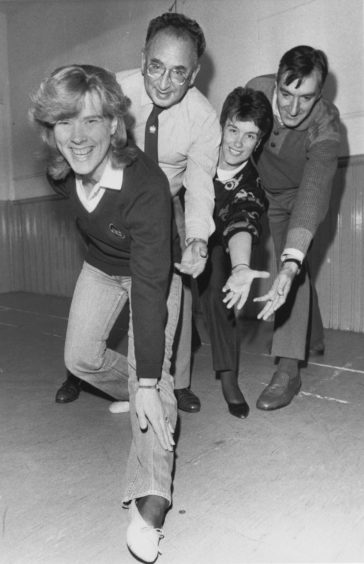 1988: Getting into shape for their next production, Magyar Melody, are three members of Pro Arte with Alan Nicol (second left) doing the coaching on stagecraft. They are (from left to right) Maureen Buchan, Roz Ellis and Michael Newns.
The new session started with a workshop in Hanover Street School, Aberdeen, and publicity convener Douglas Nisbet said that as a musical company they required to develop skills in drama and were fortunate that Alan Nicol assisted with this project. 
Mr Nisbet said there were still some vacancies for singers in the production, due to be staged in the spring, and anyone interested should attend on Monday nights at 7.30 or contact Eric Coutts, 39 Justice Street, Aberdeen