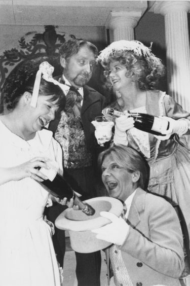 1993: The champagne is flowing as Pro Arte members (clockwise from left) Gill Johnston, Des Chrystal, Marianne Inkson and Edi Hutchison prepare for their production of La Vie Parisienne, which is at the Arts Centre this evening with performances nightly until Saturday.