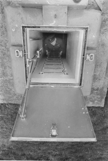 1975 - Fifteen feet under the ground, the entrance to an underground monitoring post.