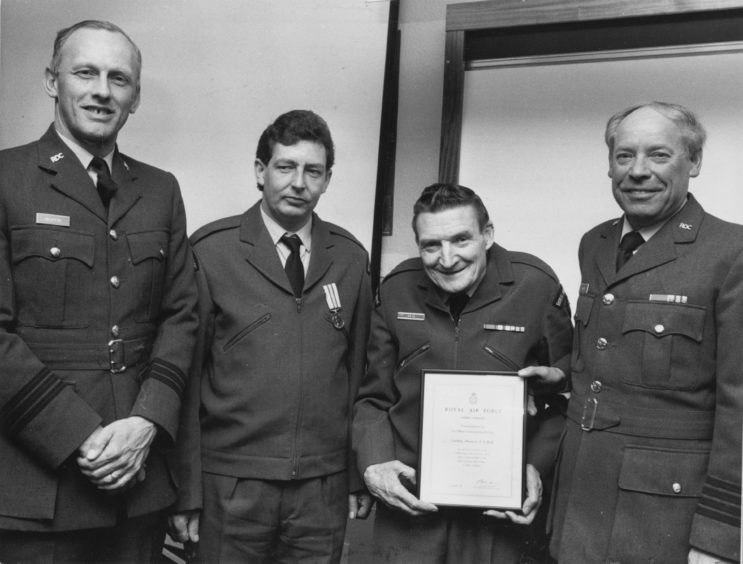 1988 - service certificate is presented to Chief Observer Sandy Reid and the ROC Medal to Alan Alexander McWilliam