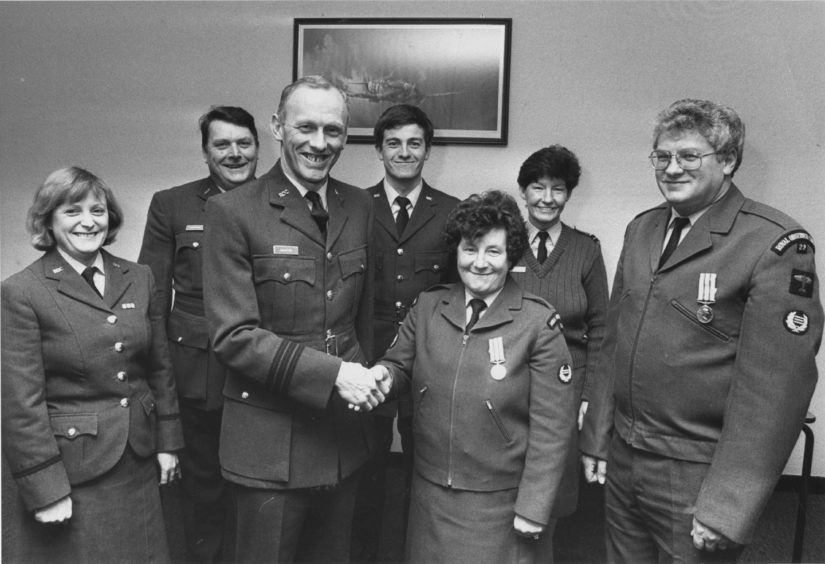 1989 - Medals for long service for Leading Woman Observer Irena Townend and Chief Observant James Cockie