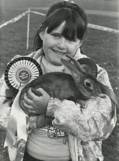 1989 - Claire McGregor 
Cove Bay Gala pets parade. Claire McGregor (8), of Langdykes Crescent, Cove, show off her rabbit Rogina, first in the any variety section. 

Used: EE 02/06/1989