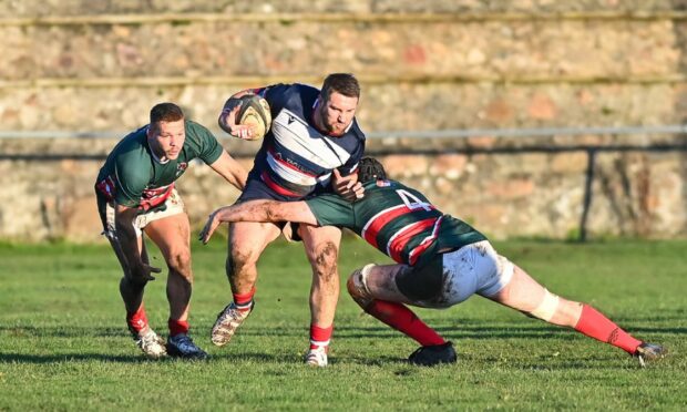 Aberdeen Grammar's Tom Aplin charges forward against GHA