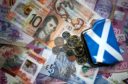 Scottish notes and coins with saltire