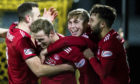 Aberdeen's Andrew Considine, James Wilson, Dean Campbell and Connor McLennan celebrate after going 2-0 up against Livingston.
