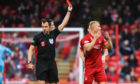 Aberdeen's Curtis Main, right, is sent off by referee Don Robertson during the Ladbrokes Premiership match between Aberdeen and Hibs.