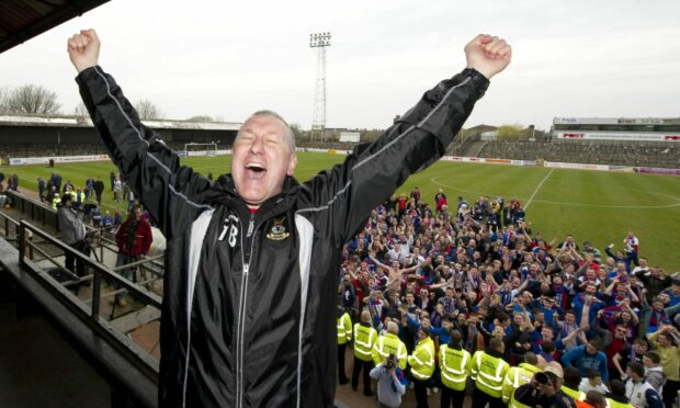 Terry Butcher celebrates as Inverness CT win the First Division title at Ayr. Image: SNS.