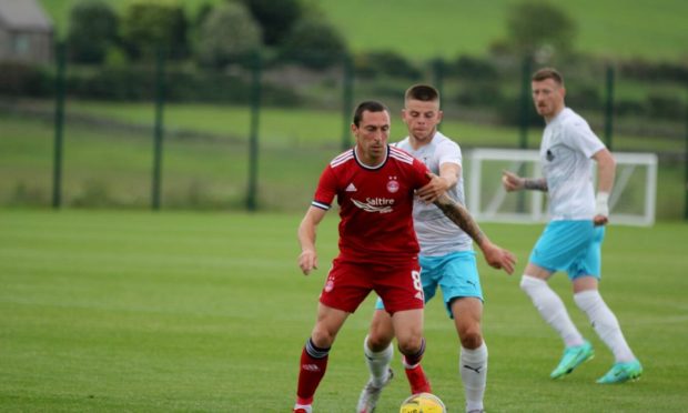 Aberdeen midfielder Scott Brown in action during the 1-1 friendly draw against Caley Thistle.
