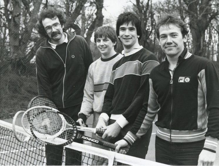 Shell 1983-02-27 Tennis (C)AJL

27 February 1983

"Ready for the start of their doubles tennis match are (left to right) Ian Newth and Mike Strachan of BP, and Hugh Mitchell and Alan Lamont from Shell."

"Competition between oil companies in the North east reached an all time high yesterday - but it was all good clean sporting fun. Thirty three teams representing 26 oil companies, competed for the Aberdeen Conference Centre Super Sports Star Trophy at the centre at Foveran House, Newburgh. About 350 men and women took part in the one day event which included an obstacle course race, tennis, pentanque, pool and darts."

Used: P&J 28/02/1983