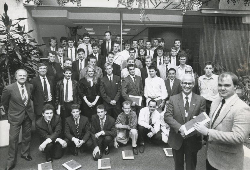 Shell 1988-09-14 Graduation Ceremony (C)AJL

14 September 1988

"Fifty successful students from throughout Scotland and as far south as Norfolk look on as Shell Expro director of operations Mr Ian Henderson presents Kevin Barrie, Macduff, with his Shell Expro Technician Scheme graduation certificate, at a ceremony in the Shell offices, Tullos, Aberdeen, yesterday."

Used: P&J 15/09/1988