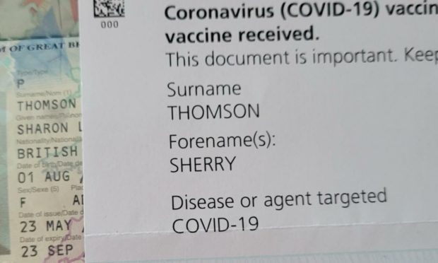 The names on Sherry Thomson's Covid vaccine certificate and her passport do not match up.