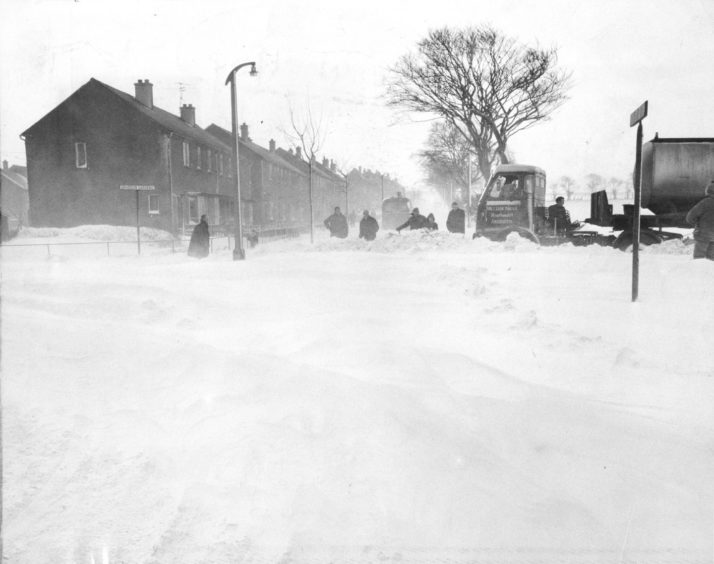 1969. This tanker, which attempted to negotiate the Howe of Bucksburn road into Northfield, had to be dug out by County Council workmen.