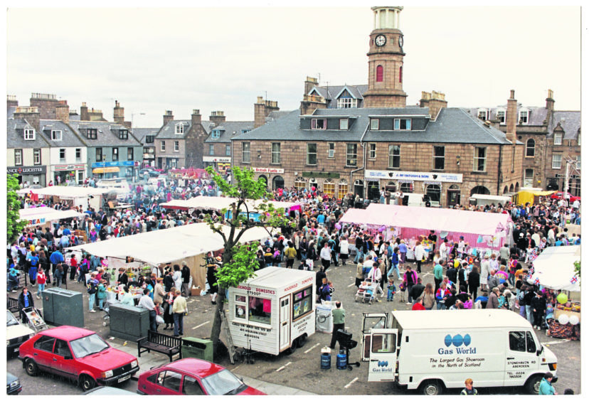 1991:  A busy day of fair exchange at Stonehaven's Feein' Market held annually on the first Saturday in June in Market Square.