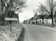 Pictured is the start of the Main Street at Tomintoul, 1976