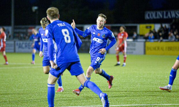 Cove Rangers captain Mitch Megginson celebrates scoring against Peterhead