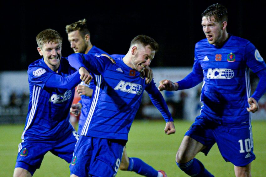 Mitch Megginson celebrates putting Cove Rangers 2-0 up against Peterhead