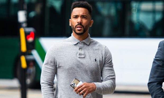 Shay Logan arrives at Aberdeen Sheriff Court to face charges of dangerous driving and drink driving