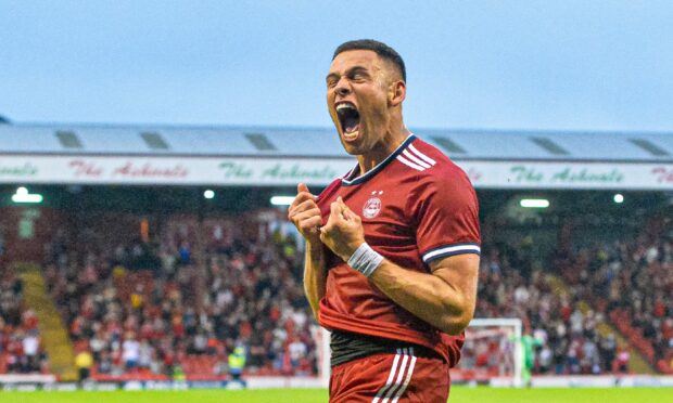 Christian Ramirez celebrates scoring on his Aberdeen debut against BK Hacken.