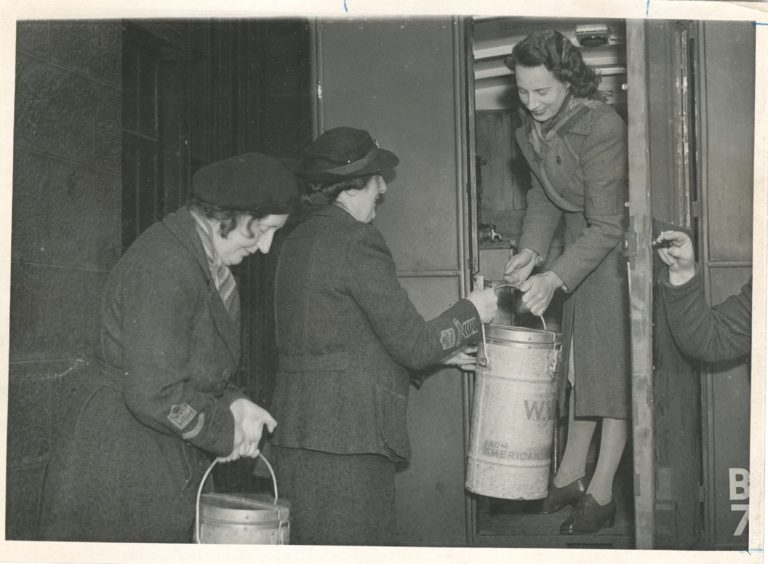1947: Helping out: The Women's Voluntary Service hard at work delivering meals in Aberdeen during the post-war era.