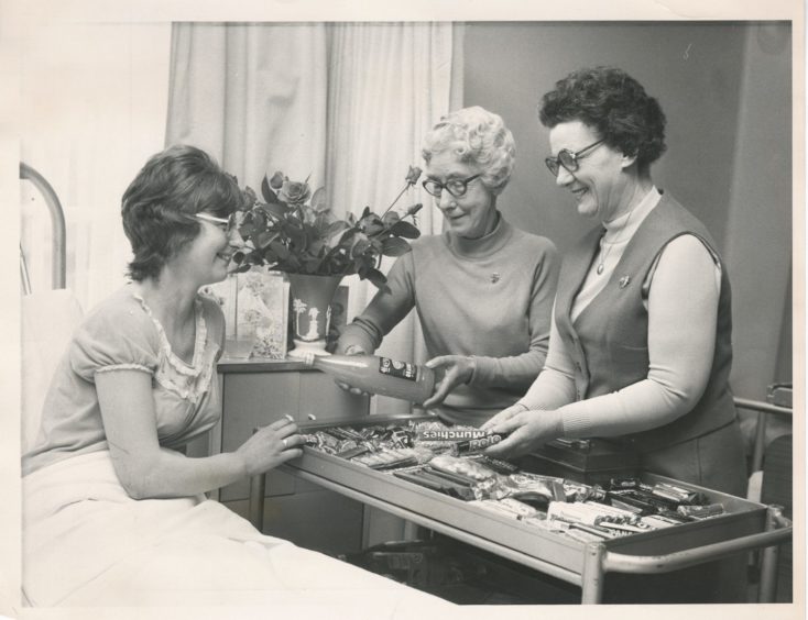 1977: WRVS members Miss Charlotte Grant and Mrs Jean Begg (right) provide a trolley service for patient Mrs Mary Bruce, Mains of Inkhorn, Auchnagatt, in Aberdeen Royal Infirmary maternity unit.