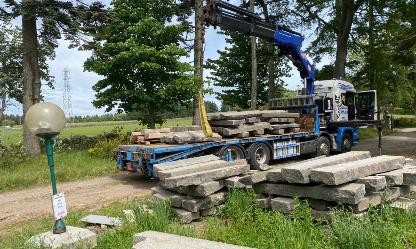 Granite from UTG was being loaded on to flatbed trucks when we arrived at Mike Wilson's home last week.