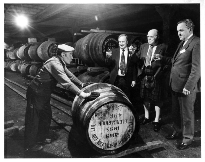 1985: Warehouseman James Alexander pushes the first barrel since the change to natural gas at Glen Garioch Distillery at Oldmeldrum