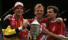 Aberdeen legends Theo Snelders, Alex McLeish and Hans Gillhaus with the Scottish Cup in 1990 - the last time the club won it. Image: SNS