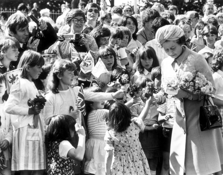 1984: The Queen is surrounded by wellwishers after opening the Queen Elizabeth Bridge