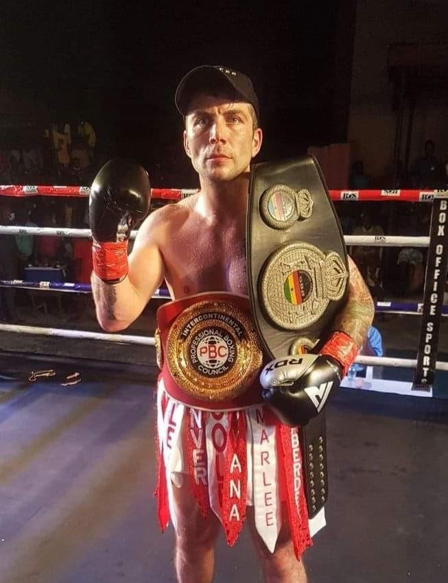 Aberdeen boxer Lee McAllister with title belt following victory in Ghana in 2021.