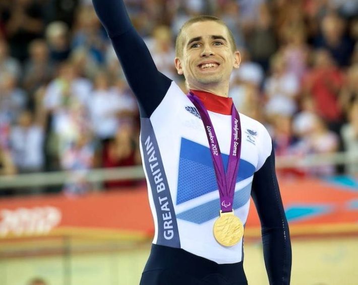 Neil Fachie is defending two titles at the Commonwealth Games