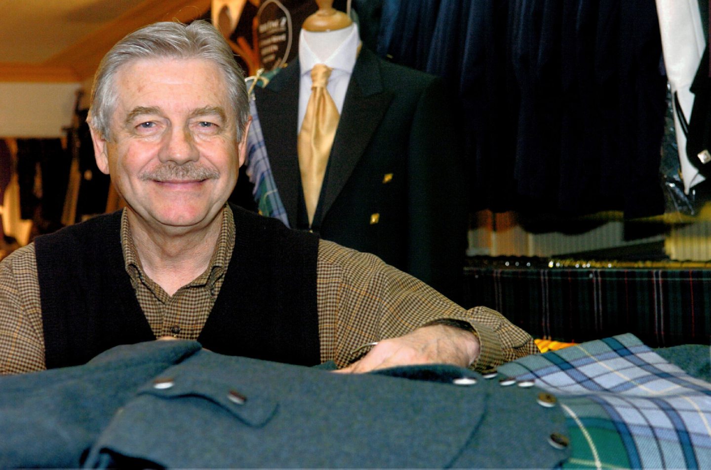 Elvis Presley's cousin, Archie Bennet, with the Presley tartan outfit in 2004.