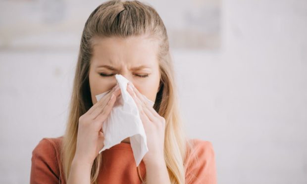 Sneezing is becoming an increasingly-common Covid symptom - but only among those who have received both doses of the vaccine.