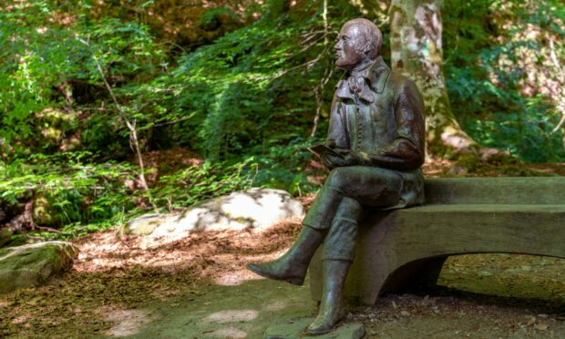 The statue of Robert Burns at Falls of Moness.