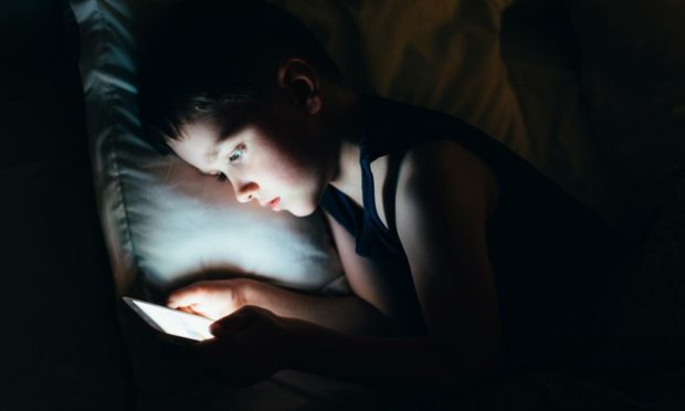 Children use many apps every day to socialise and play games (Photo: Daniel Jedzura/Shutterstock)