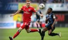 David Bates (left) in action for Hamburg against Paderborn's Christopher Antwi-Adjei.