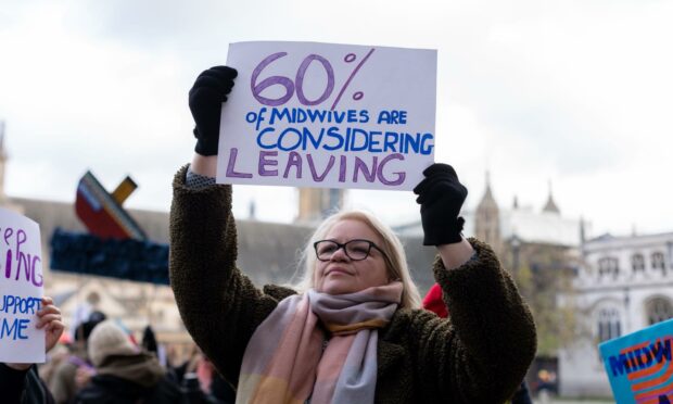 A March with Midwives protestor in London (Photo: Belinda Jiao/SOPA Images/Shutterstock)