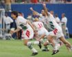 Bulgarian soccer players, from left: Daniel Borimirov, Ilian Kiriakov (16), Petra Houbtchev (5 partly hidden) and Hristo Stoitchkov (8) celebrate after Irodan Letchkov, unseen, scored the winning goal against Mexico in a penalty shootout during the second round World Cup soccer match at Giants Stadium, East Rutherford, New Jersey.