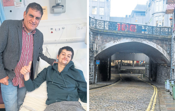 Kyle Duncan, with dad Michael, is recovering in hospital after falling from a city centre bridge