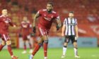 Aberdeen's Jay Emmanuel-Thomas has had his contract terminated, after just one goal in 24 games.