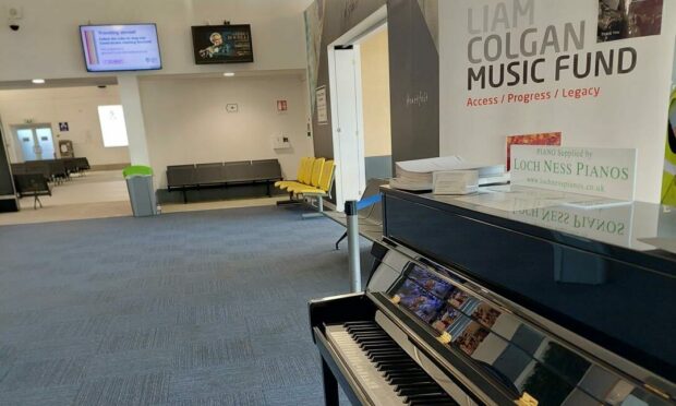 Pop-up piano in Inverness airport.