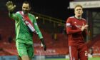 Aberdeen's Joe Lewis and David Bates after the 2-0 defeat of Livingston.