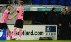 Inverness' Sean Welsh celebrates with David Carson as manager Billy Dodds looks on.