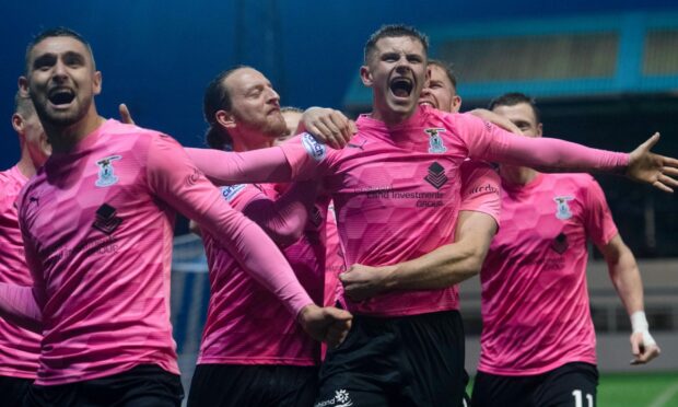 Inverness' Reece McAlear celebrates making it 4-1 against Morton.