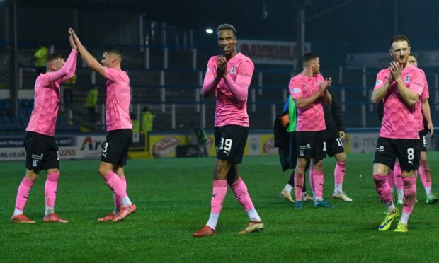 The Inverness players applaud the fans at full-time after their 6-1 win over Morton.
