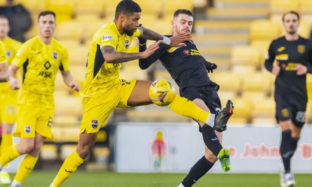 Dominic Samuel in action for Ross County against Livingston.