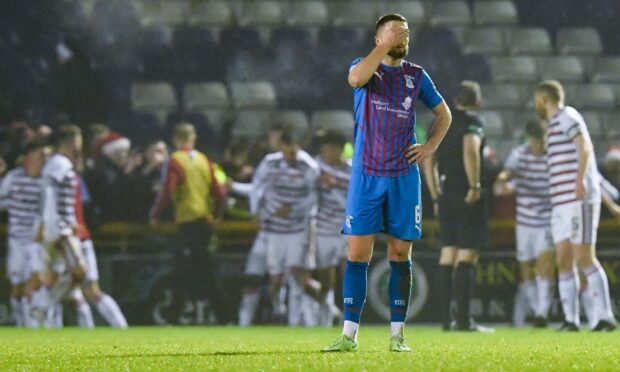 Inverness' Robbie Deas look dejected after Hamilton make it 2-1.