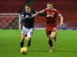 Aberdeen's Jonny Hayes, right, and Luke McCowan of Dundee compete for the ball at Pittodrie