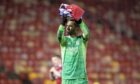 Aberdeen's Joe Lewis applauds the fans at full time after a 2-1 win over Dundee. Image: SNS.
